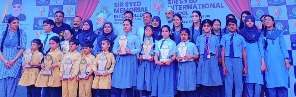 Sir Syed Memorial School's annual examination results were 100%, meritorious students were rewarded.