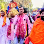 Baba Khatu Shyam seated in a golden palanquin