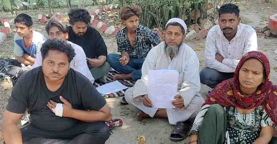 The victim's family staged a sit-in at the DM's office over a land dispute, demanding justice.