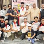 Players showed their strength in district level arm wrestling.
