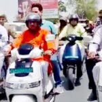 Mayor Dr. Ajay Kumar rode an electric scooter in the scorching sun.