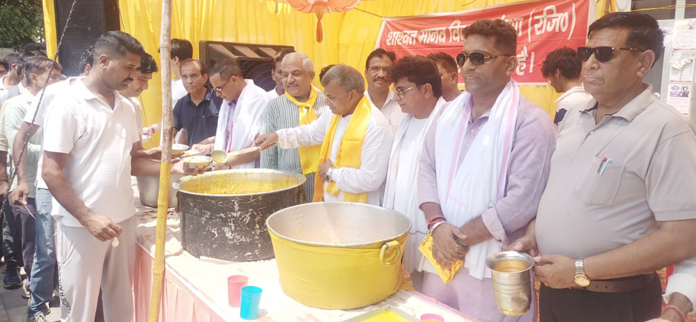 Soft drink distribution and 'Maa Annapurna Bhandara' camp organized.