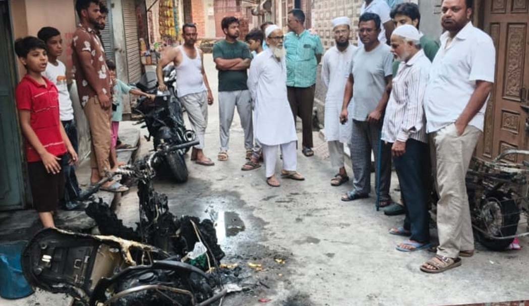 Massive fire breaks out in house after electric scooter battery explodes; four vehicles gutted.