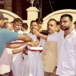 Congress workers distributed sweets upon Dharmendra Pradhan's resignation.